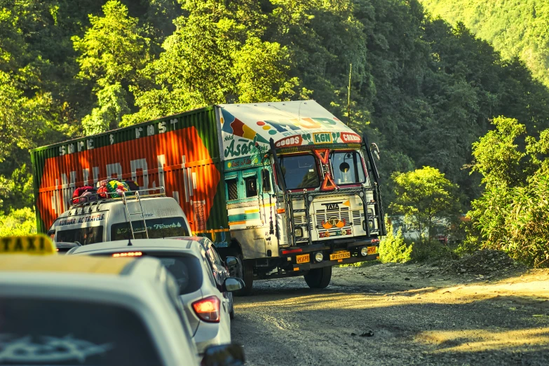 a semi truck and bus on the road