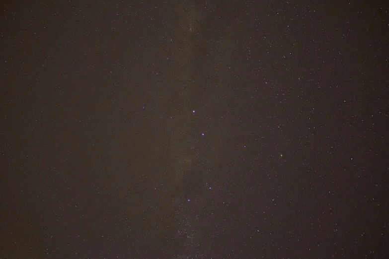 starry sky in black background and some building