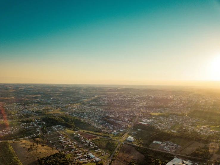 view from inside a plane looking out at a city