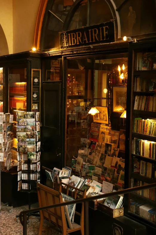 many books are on display in the window of a bookstore