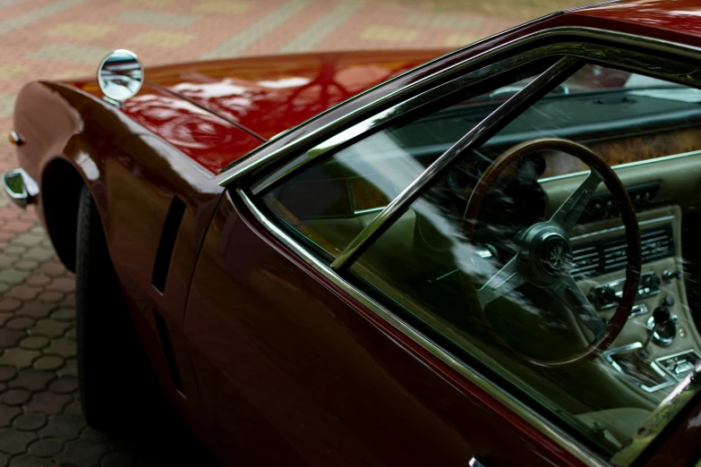 a close up of the cockpit and steering wheel of a car