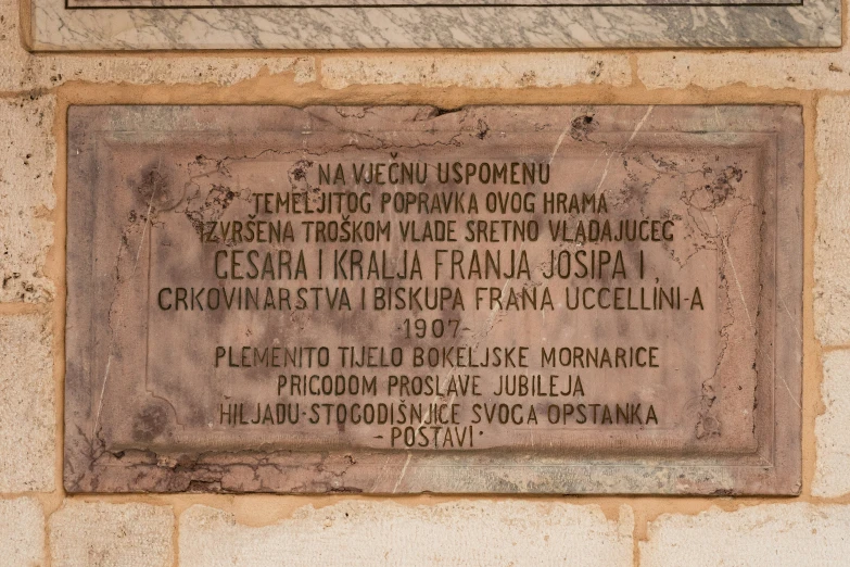a monument with an image of several names on it