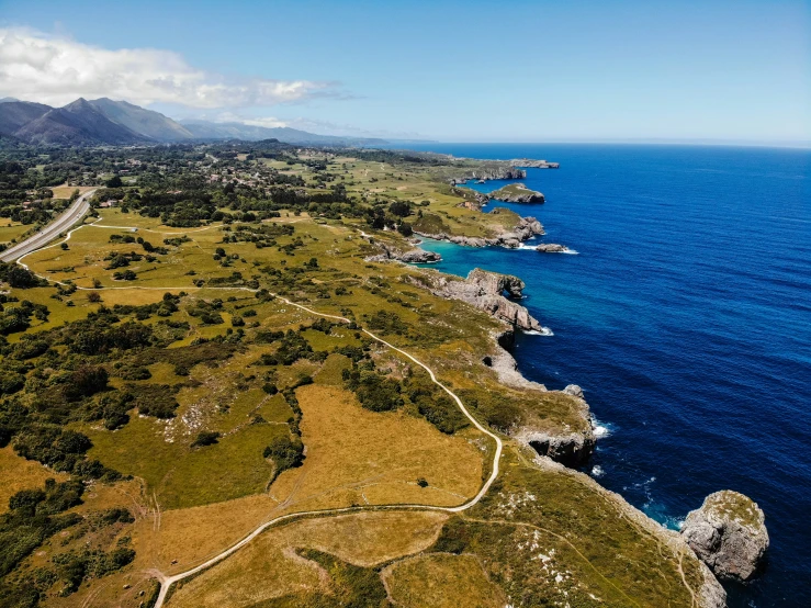 an aerial view of the coastline in the ocean