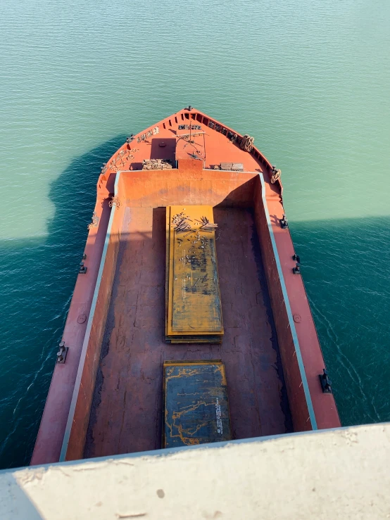 a large cargo ship floating on the open water