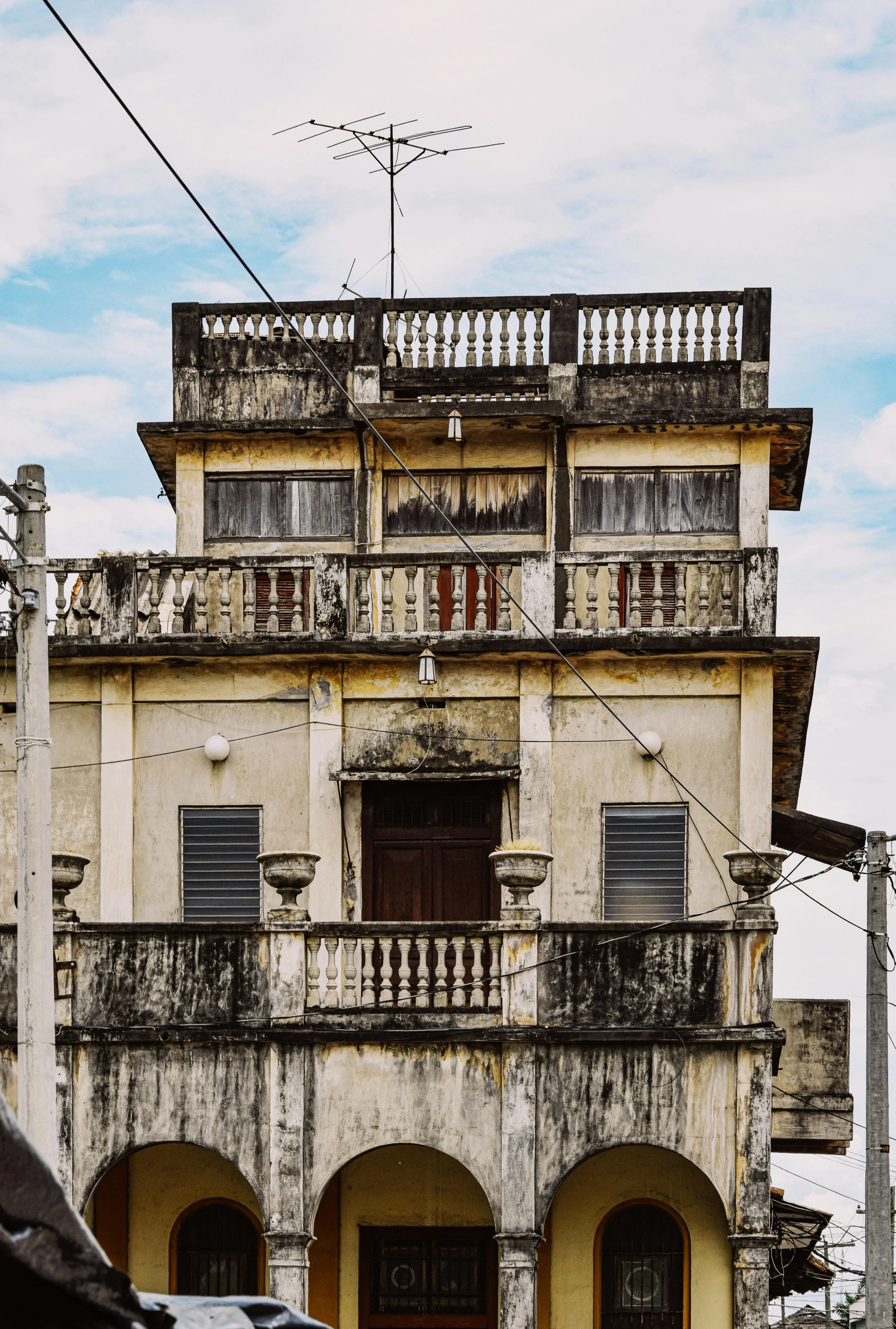 a big house with some balconies on top