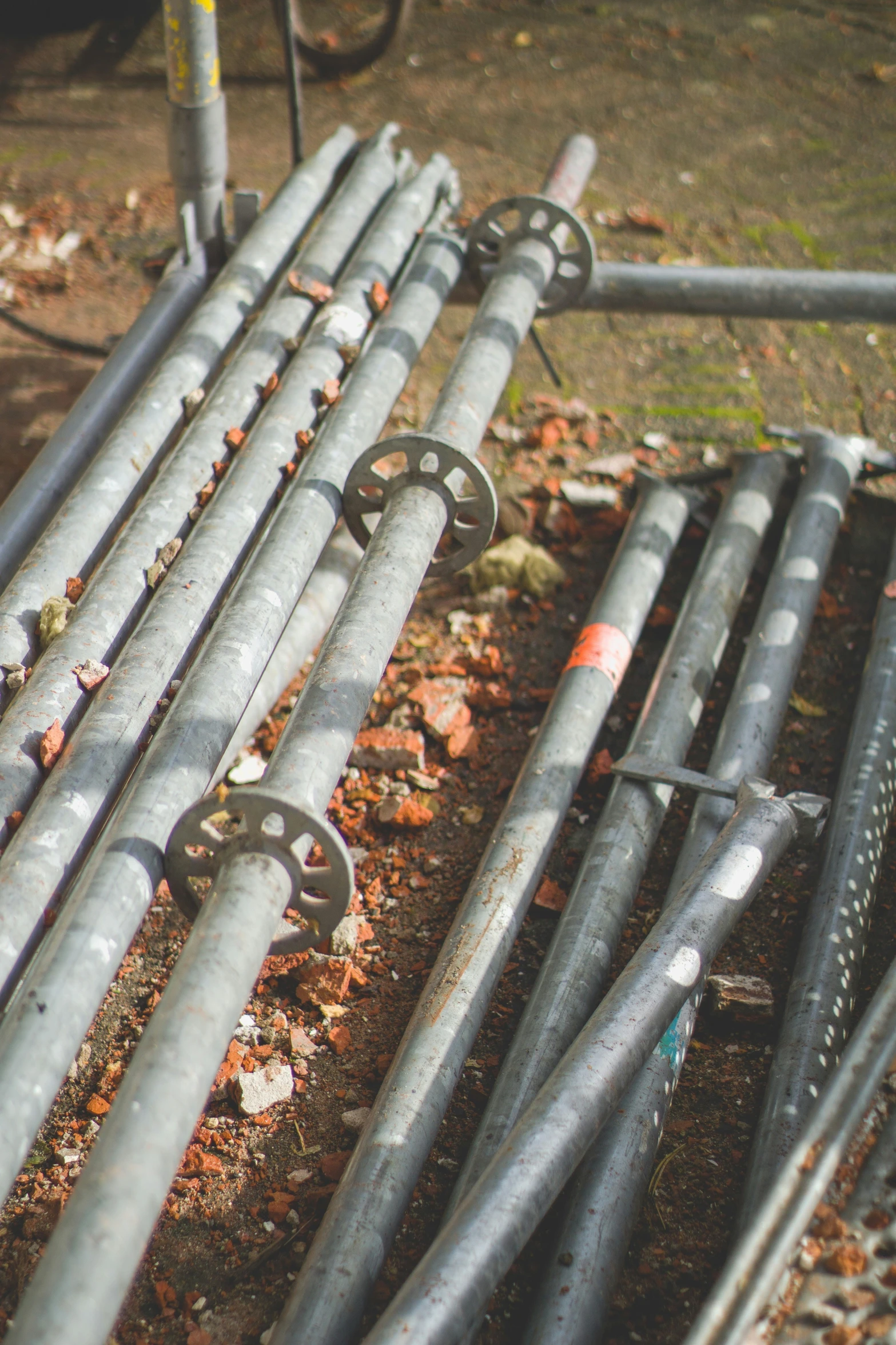 some large metal pipes with nuts and rivets