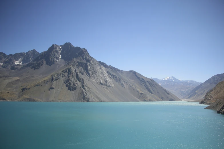 mountains are visible across the blue body of water