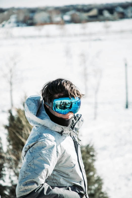 a man that is wearing some kind of snowboard