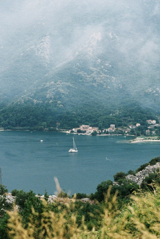 the boat is on a large body of water