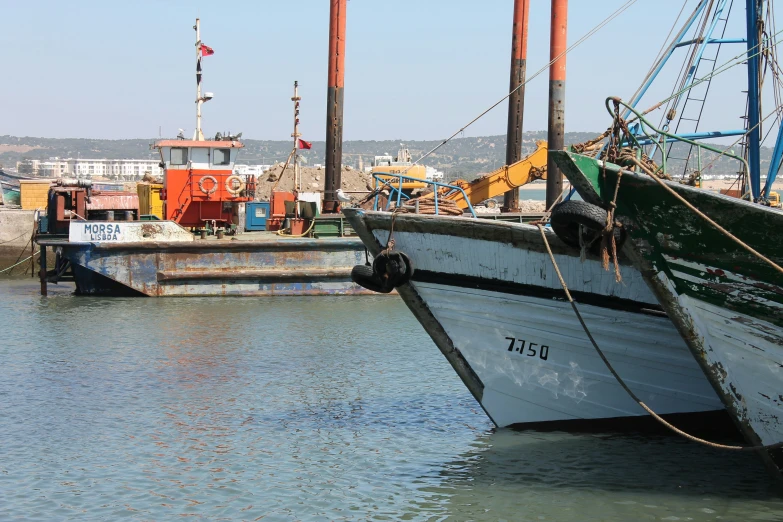 a large boat is docked in the water