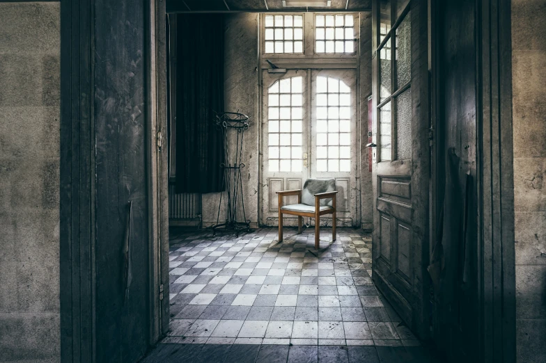 a white chair sitting in an open doorway