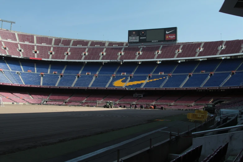 the inside of a stadium with several rows of seats