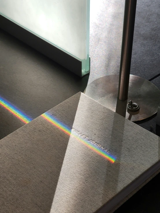 a large rainbow lens is shown on the floor