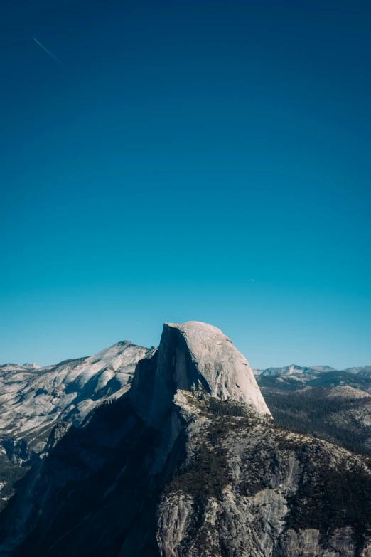 a very big tall snowy mountain in the sky