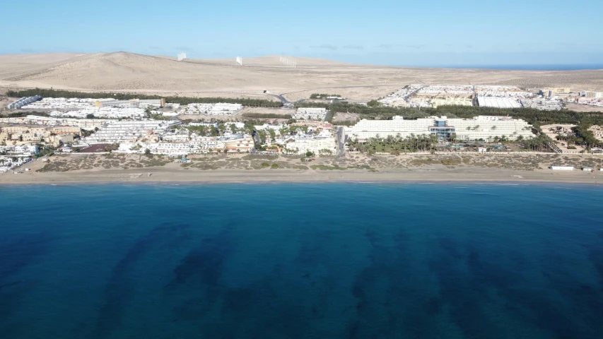 some houses that are near the ocean