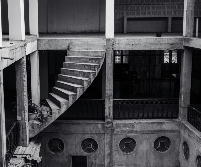 black and white pograph of the inside of an apartment building