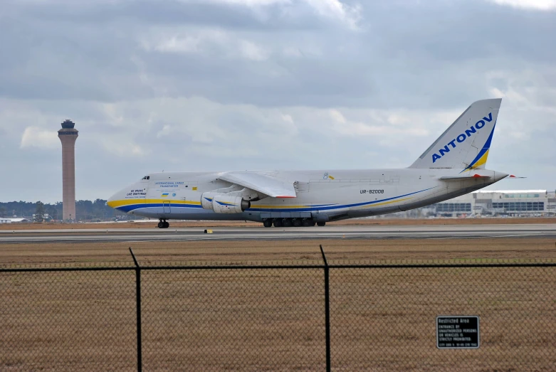 a large white airplane on a run way