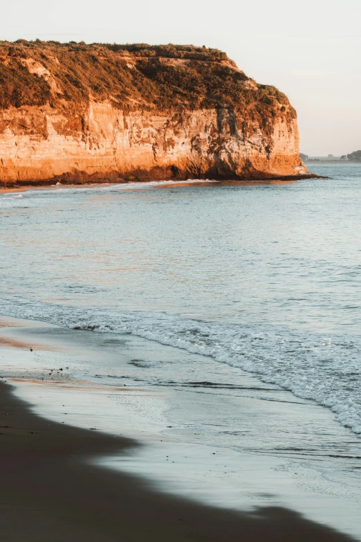 the sandy beach by the shoreline is clear and clear