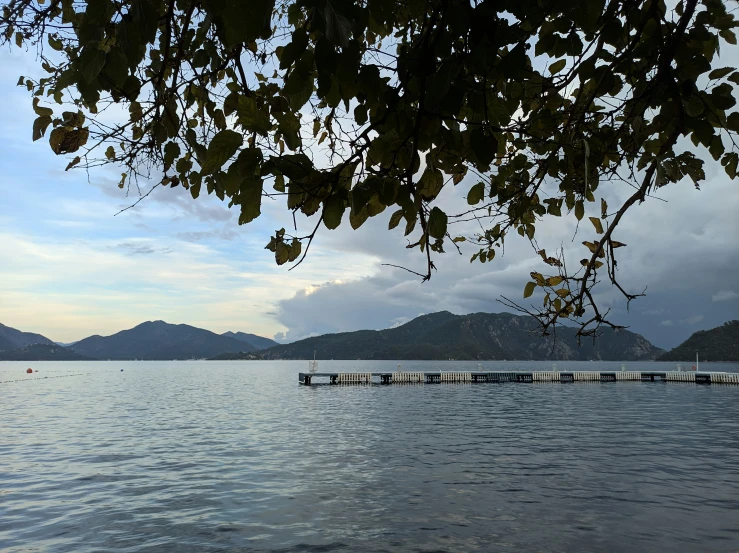 a body of water with small boats in it