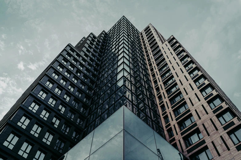 looking up at the two sides of large buildings