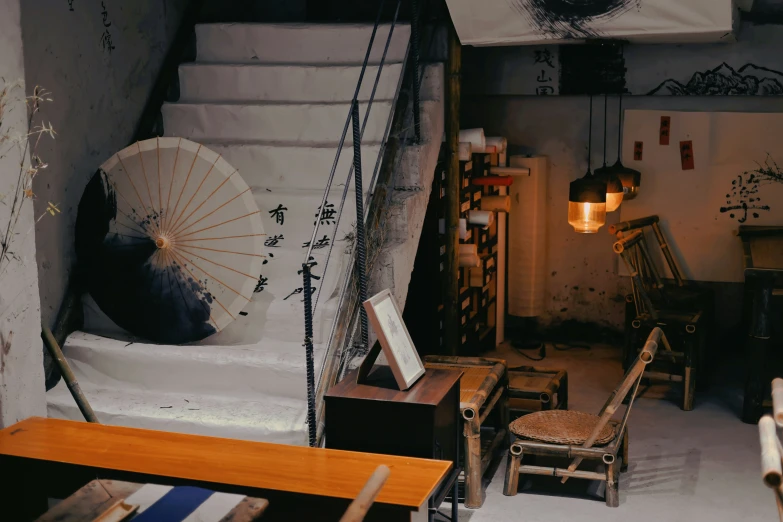 a japanese living room has a chair and parasol