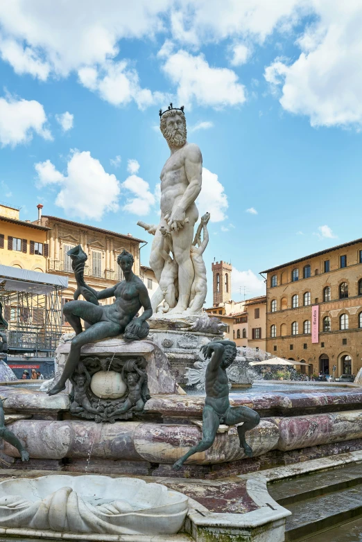 sculptures on a water feature in an outdoor space