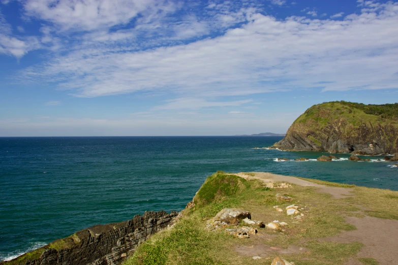 an overpass with a cliff overlooking the ocean