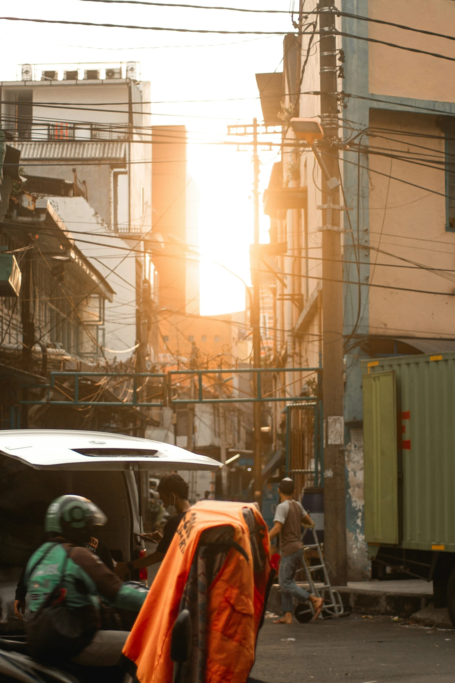 a man riding a motorcycle behind another motor bike