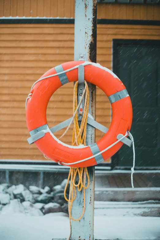 a life preserver hanging from a metal pole