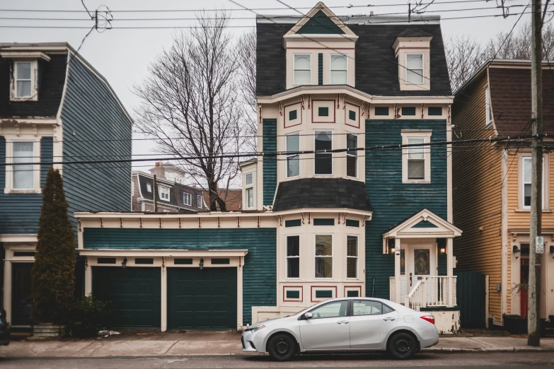 a car parked in front of some houses