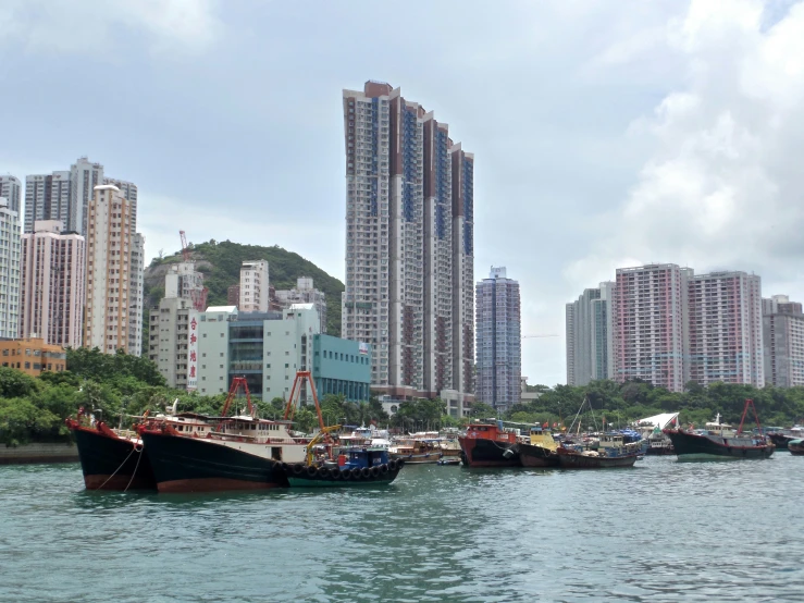 there are several boats docked in the water