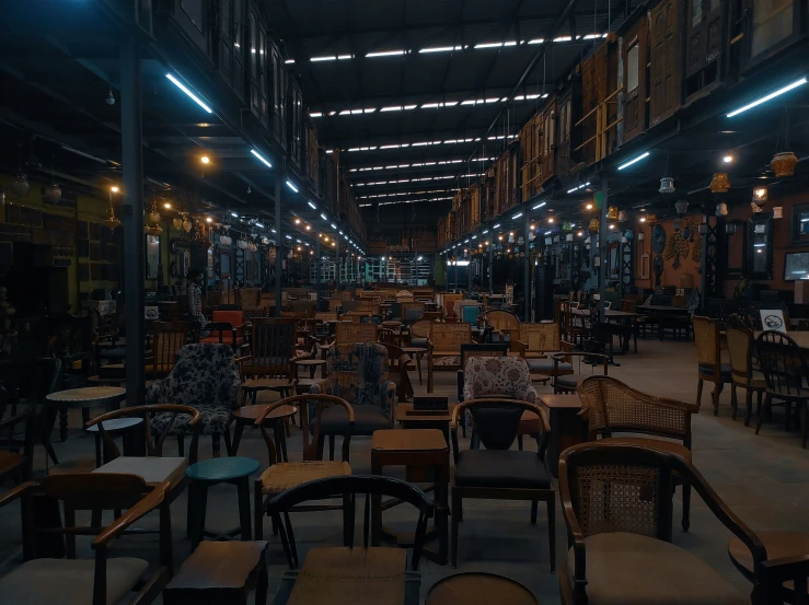 an empty restaurant is shown at night time