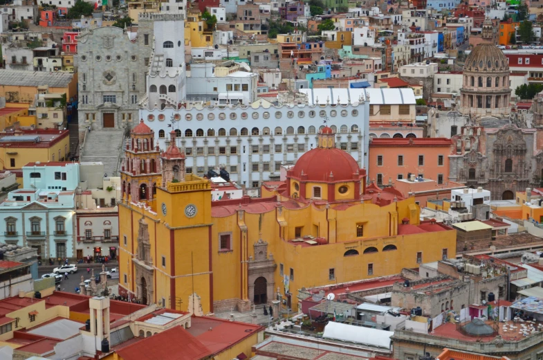 a view from above looking at many brightly colored buildings