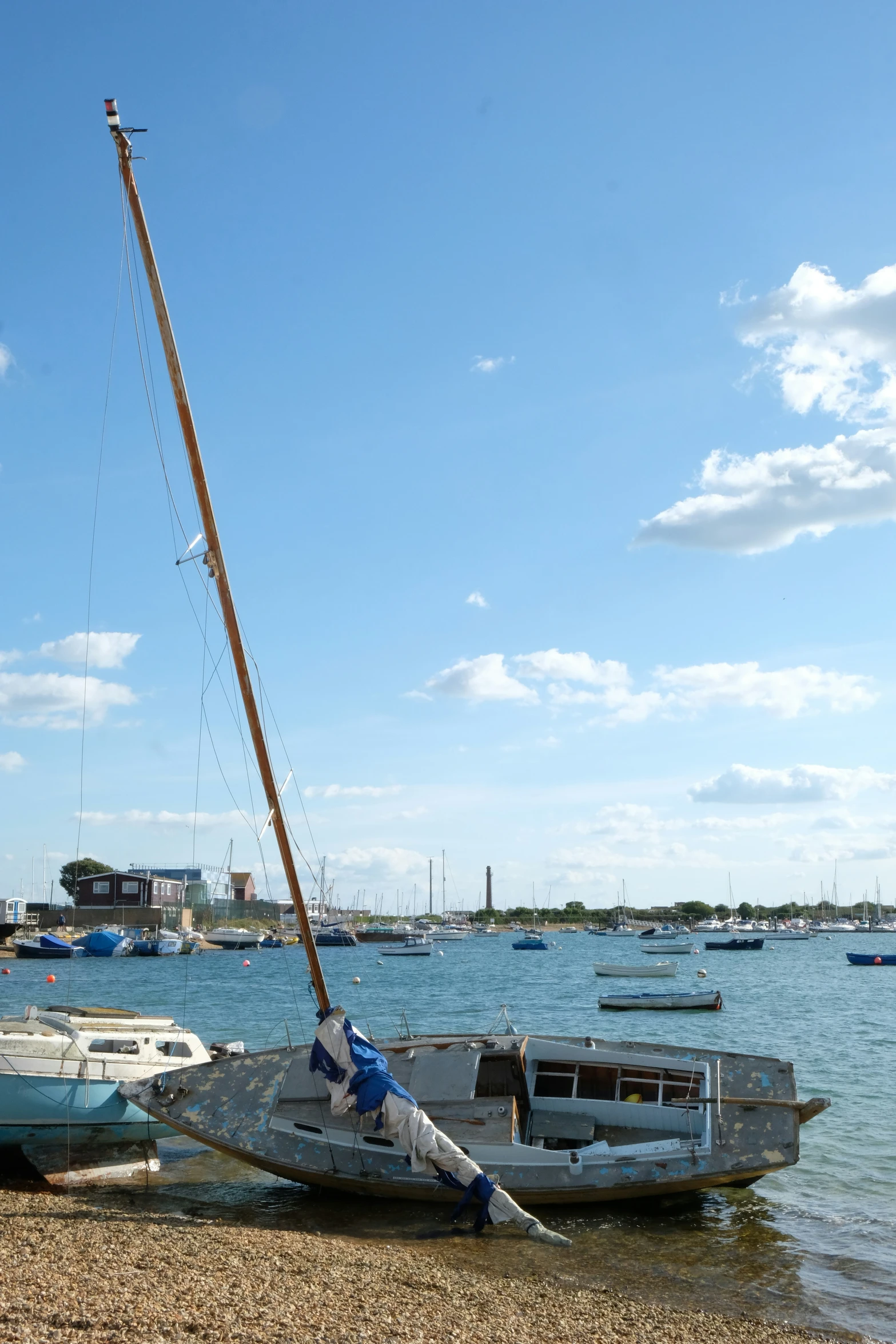 a boat docked on the shore in the water