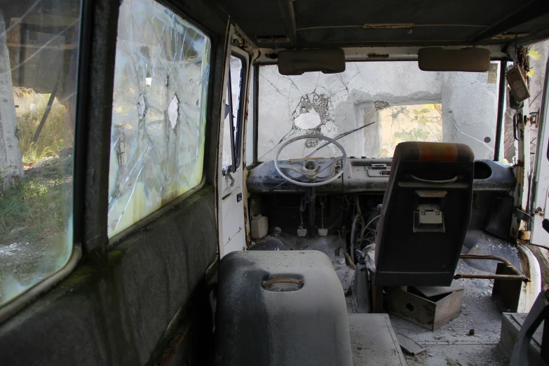 inside of a wrecked truck with a bicycle on the back and side