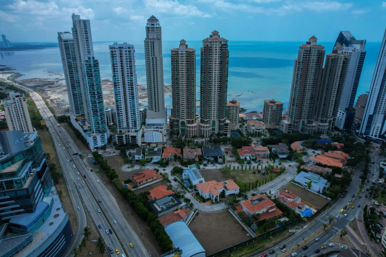 a group of high rise buildings near the beach