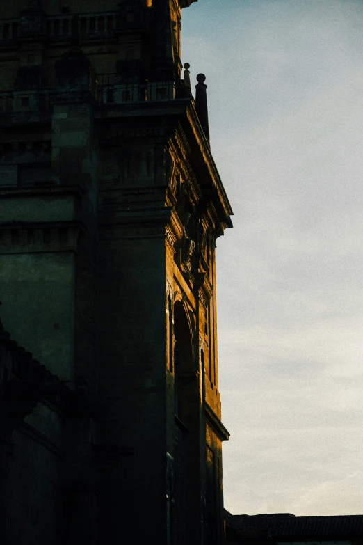 the steeple of a tower of an old building