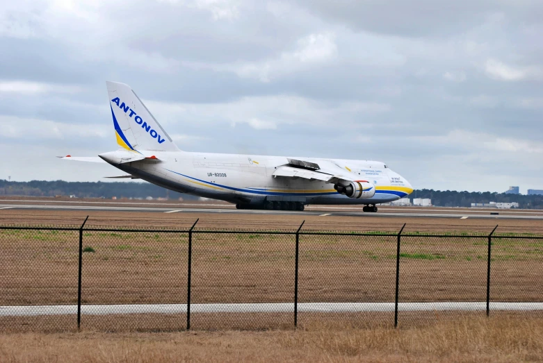 an airplane sitting on the ground at an airport