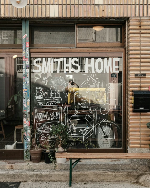 the shop window is decorated with various graffiti