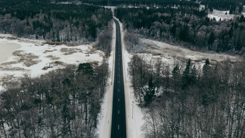 aerial s of road in snow on snowy day