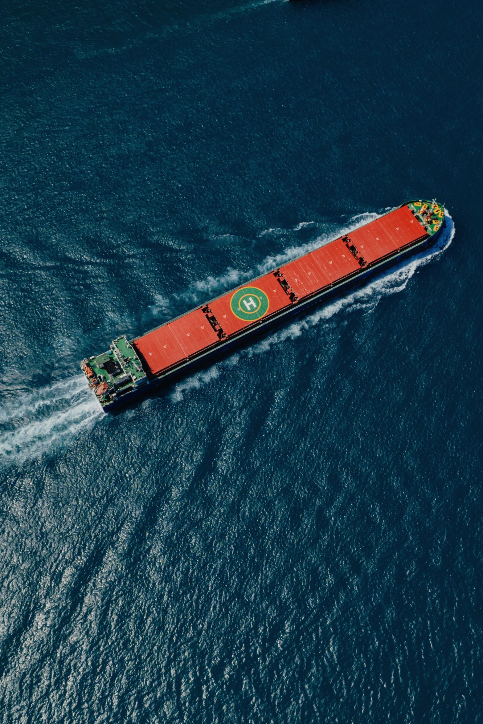 a large container ship riding through the ocean