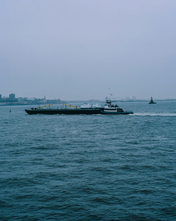 a large boat traveling on top of a body of water