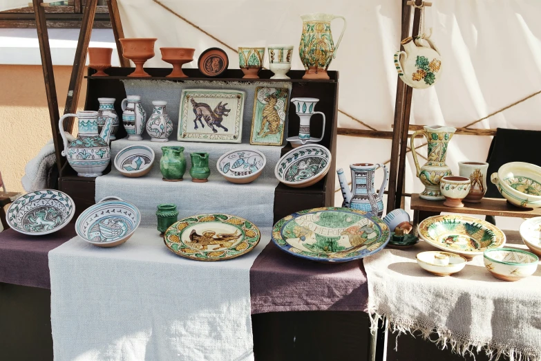 a table with plates on it and a tray on top