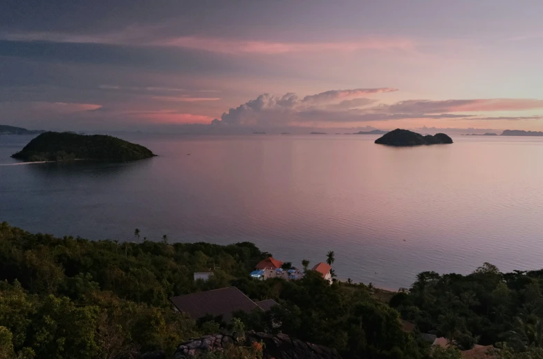 the evening over some small islands and trees