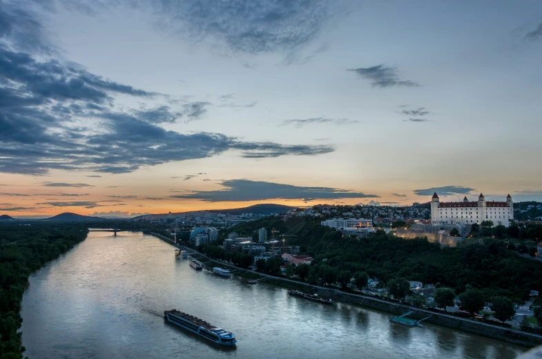 an aerial view of a city and a large river