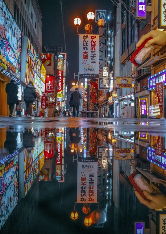 people walking in an asian city at night