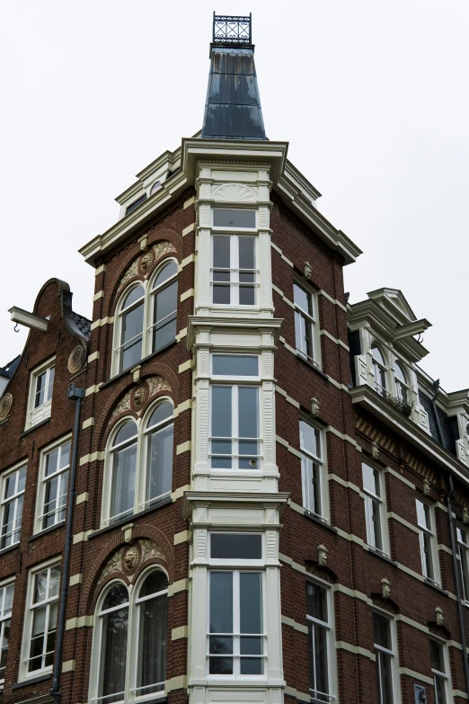 an old brick building with a clock tower on top