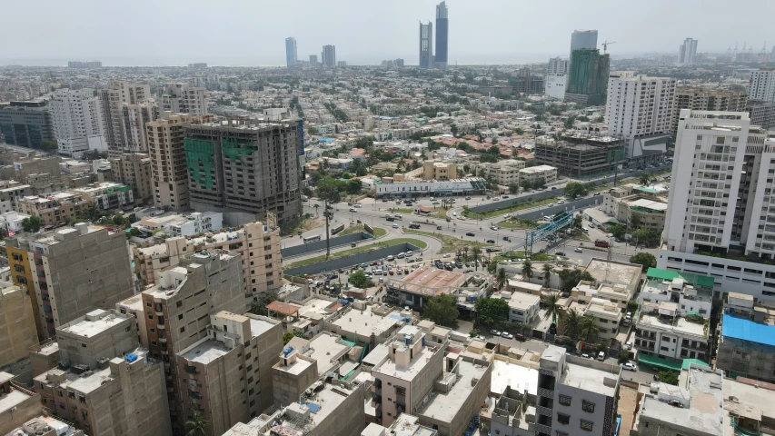 the view from the top of an apartment building in the city