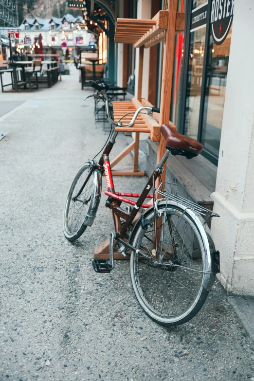 there is a old bicycle in the street