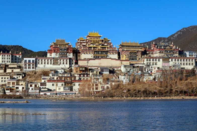 some very pretty buildings by a lake in china